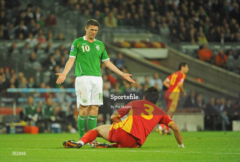 14 October 2009; Republic of Ireland's Robbie Keane argues with Montenegro's Marko Basa after being bundled over in the box. 2010 FIFA World Cup Qualifier, Republic of Ireland v Montenegro, Croke Park, Dublin. Picture credit: Pat Murphy / SPORTSFILE