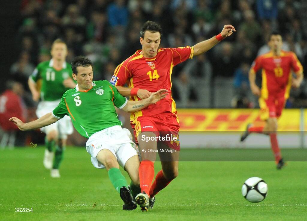 14 October 2009; Liam Miller, Republic of Ireland, in action against Dejan Damjanovic, Montenegro. 2010 FIFA World Cup Qualifier, Republic of Ireland v Montenegro, Croke Park, Dublin. Picture credit: Oliver McVeigh / SPORTSFILE