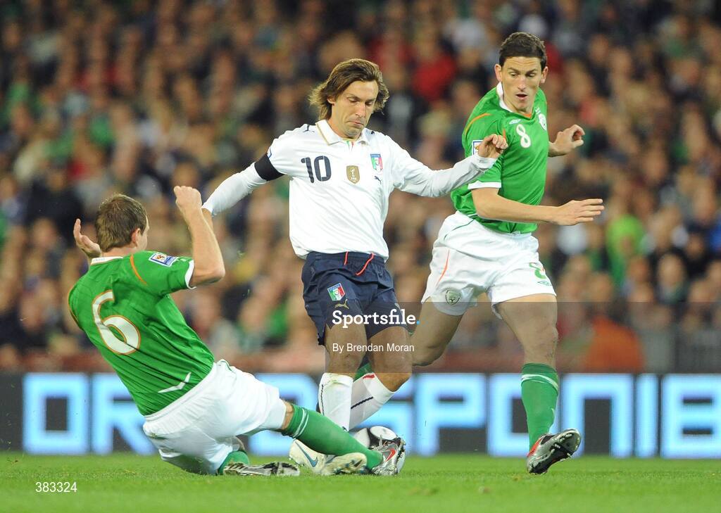 10 October 2009; Andrea Pirlo, Italy, is tackled by Glenn Whelan, Republic of Ireland. 2010 FIFA World Cup Qualifier, Republic of Ireland v Italy, Croke Park, Dublin. Picture credit: Brendan Moran / SPORTSFILE