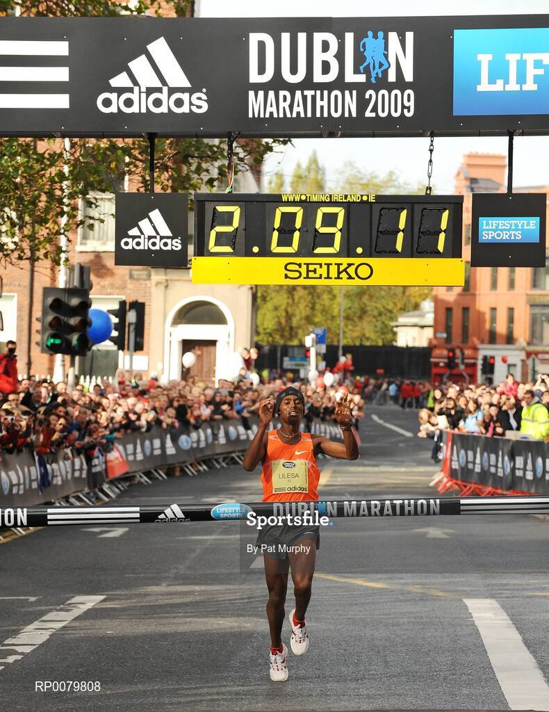 26 October 2009; Feyisa Lilesa, Ethiopia, crosses the finish line to win the Lifestyle Sports - adidas Dublin Marathon 2009. Merrion Square, Dublin. Picture credit: Pat Murphy / SPORTSFILE