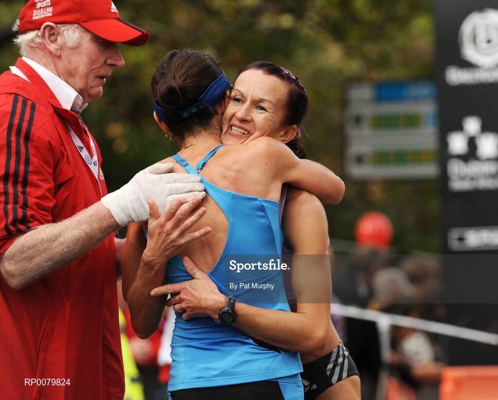 26 October 2009; First Irish woman home Annette Kealy, left, is congratulated by second Irish woman home Pauline Curley after the Lifestyle Sports - adidas Dublin Marathon 2009. Merrion Square, Dublin. Picture credit: Pat Murphy / SPORTSFILE