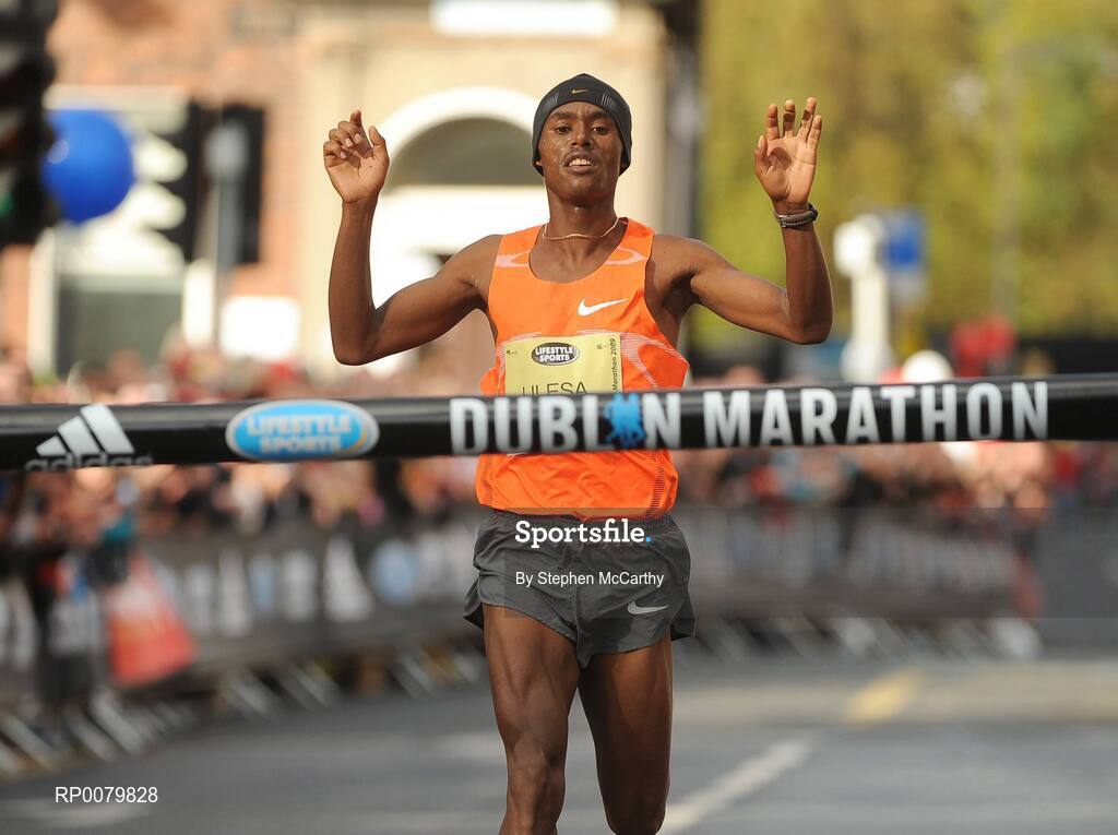 26 October 2009; Feyisa Lilesa, Ethiopia, crosses the finish line to win the Lifestyle Sports - adidas Dublin Marathon 2009. Merrion Square, Dublin. Picture credit: Stephen McCarthy / SPORTSFILE