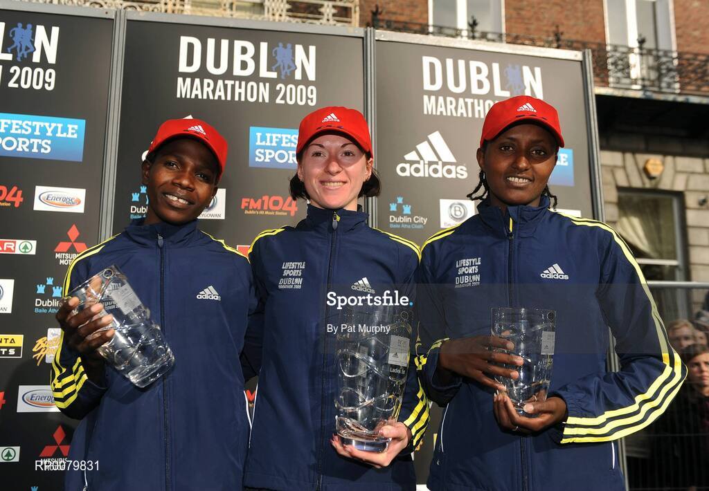 26 October 2009; Kateryna Stetsenko, Ukraine, centre, who won the Lifestyle Sports - adidas Dublin Marathon 2009 with second placed Helalia Johannes, Namibia, left, and third placed Tiki Gelana, Ethiopia, right. Merrion Square, Dublin. Picture credit: Pat Murphy / SPORTSFILE
