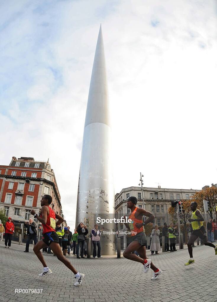 26 October 2009; Eventual winner Feyisa Lilesa, Ethiopia middle, passes the Spire during the Lifestyle Sports - adidas Dublin Marathon 2009. O'Connell Street, Dublin. Picture credit: Stephen McCarthy / SPORTSFILE