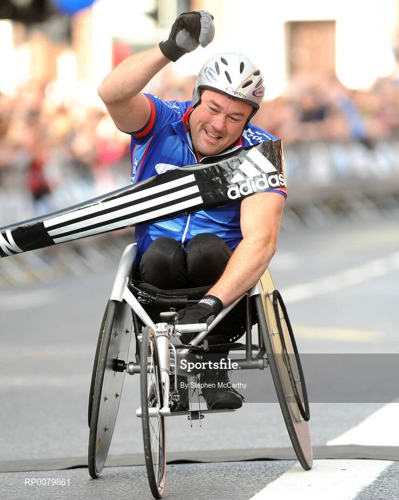 26 October 2009; Richie Powell, from Wales, celebrates winning the wheelchair race during the Lifestyle Sports - adidas Dublin Marathon 2009. Merrion Square, Dublin. Picture credit: Stephen McCarthy / SPORTSFILE