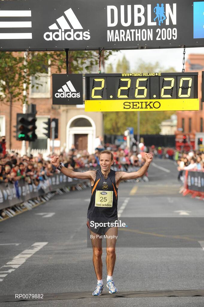 26 October 2009; Pauric McKinney, Letterkenny A.C., crosses the finish line to finish second in the Irish National Championship during the Lifestyle Sports - adidas Dublin Marathon 2009. Merrion Square, Dublin. Picture credit: Pat Murphy / SPORTSFILE