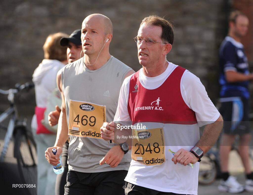26 October 2009; Adrian Fitzmaurice, right, Athenry A.C., Co. Galway, in action during the Lifestyle Sports - adidas Dublin Marathon 2009. Dublin. Picture credit: Ray McManus / SPORTSFILE
