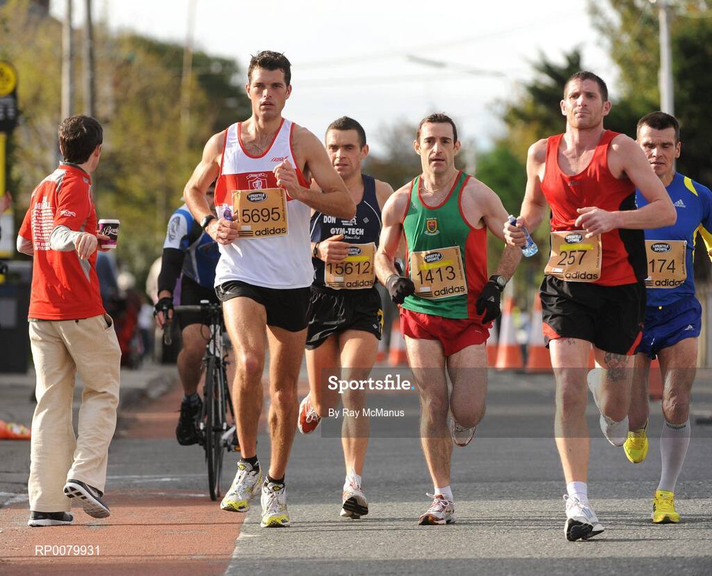 26 October 2009; Liam McFadden, Galway A.C., left, T.J. McHugh, Mayo A.C., 1423, and Derek O'Leary, 257, in action during the Lifestyle Sports - adidas Dublin Marathon 2009. Dublin. Picture credit: Ray McManus / SPORTSFILE