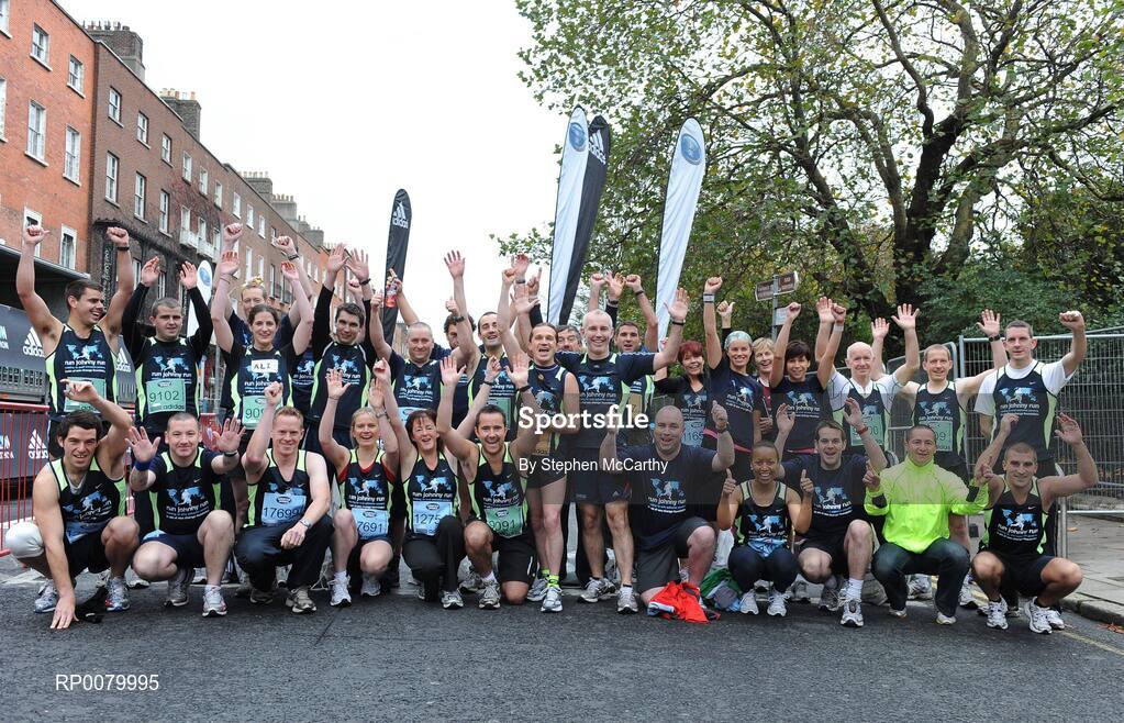 26 October 2009; Former Sawdoctor Johnny Donnelly, and TV presenter Ray D'Arcy, with his group of runners running in aid of Run Johnny Run. Johnny is aiming to run 80 marathons in four years for the SeeChange charity ahead of the Lifestyle Sports - adidas Dublin Marathon 2009. Merrion Square, Dublin. Picture credit: Stephen McCarthy / SPORTSFILE