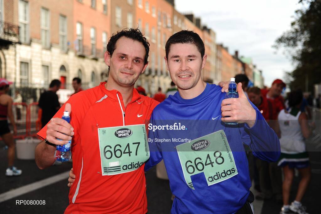 26 October 2009; Gerard Morris, left, and Keith Lai, both from Dublin, after finishing the Lifestyle Sports - adidas Dublin Marathon 2009. Merrion Square, Dublin. Picture credit: Stephen McCarthy / SPORTSFILE