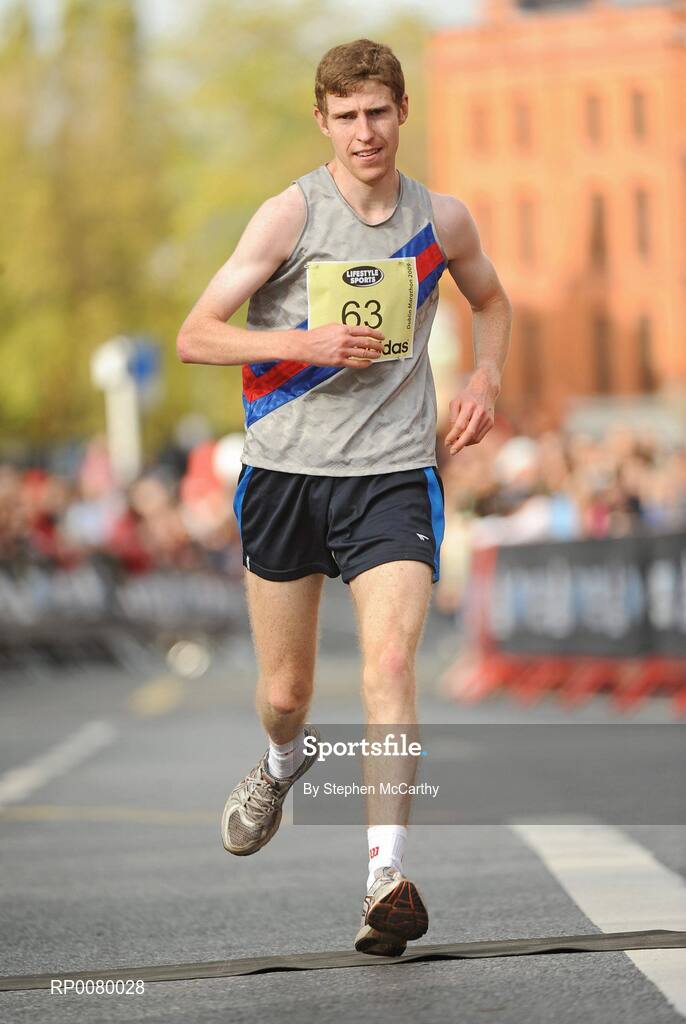 26 October 2009; Robert Teevan, Dundrum South Dublin A.C., crosses the finish line during the Lifestyle Sports - adidas Dublin Marathon 2009. Merrion Square, Dublin. Picture credit: Stephen McCarthy / SPORTSFILE