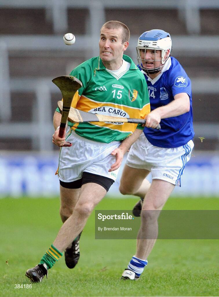 1 November 2009; Ben O'Connor, Newtownshandrum, in action against Johnny Enright, Thurles Sarsfields. AIB GAA Hurling Munster Senior Club Championship Quarter-Final, Thurles Sarsfields v Newtownshandrum, Semple Stadium, Thurles, Co. Tipperary. Picture credit: Brendan Moran / SPORTSFILE