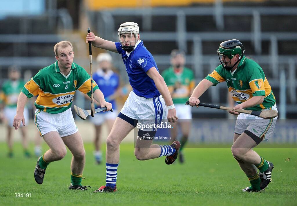 1 November 2009; Denis Maher, Thurles Sarsfields, in action against Dermot Gleeson, left, and Philip Noonan, Newtownshandrum. AIB GAA Hurling Munster Senior Club Championship Quarter-Final, Thurles Sarsfields v Newtownshandrum, Semple Stadium, Thurles, Co. Tipperary. Picture credit: Brendan Moran / SPORTSFILE