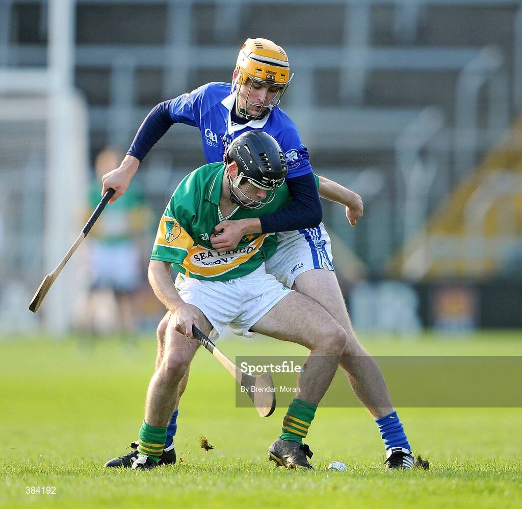 1 November 2009; Jerry O'Mahony, Newtownshandrum, holds off the challenge of Pa Bourke, Thurles Sarsfields. AIB GAA Hurling Munster Senior Club Championship Quarter-Final, Thurles Sarsfields v Newtownshandrum, Semple Stadium, Thurles, Co. Tipperary. Picture credit: Brendan Moran / SPORTSFILE