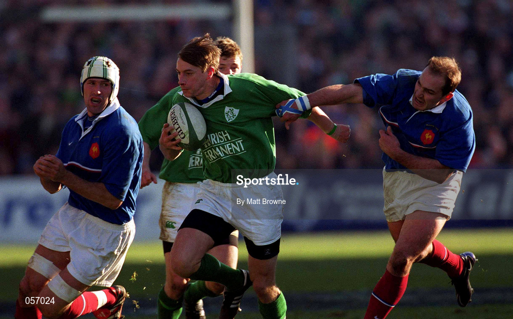 17 February 2001; Tyrone Howe of Ireland is tackled by Christophe Juillet, left, and Richard Dourthe of France during the Lloyds TSB Six Nations Rugby Championship match between Ireland and France at Lansdowne Road in Dublin. Photo by Matt Browne/Sportsfile