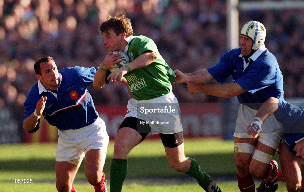 17 February 2001; Tyrone Howe of Ireland is tackled by Christophe Juillet, left, and Richard Dourthe of France during the Lloyds TSB Six Nations Rugby Championship match between Ireland and France at Lansdowne Road in Dublin. Photo by Matt Browne/Sportsfile