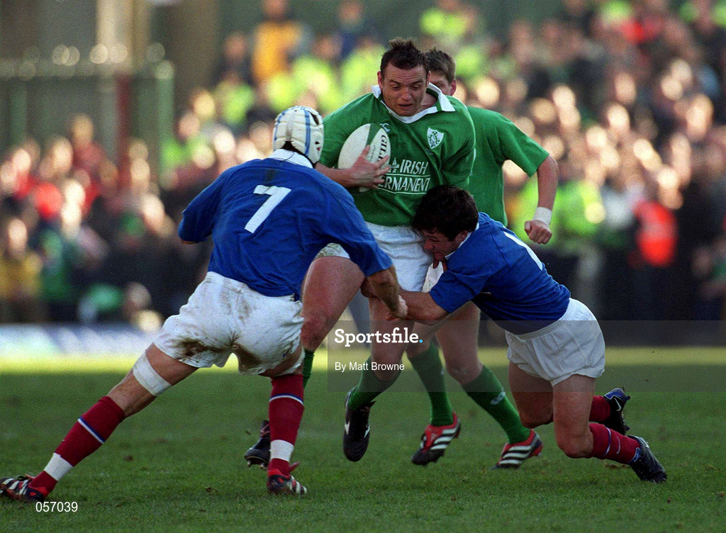 17 February 2001; Ireland's Rob Henderson is tackled by Christophe Juillet, 7, and Franck Comba of France during the Lloyds TSB Six Nations Rugby Championship match between Ireland and France at Lansdowne Road in Dublin. Photo by Matt Browne/Sportsfile