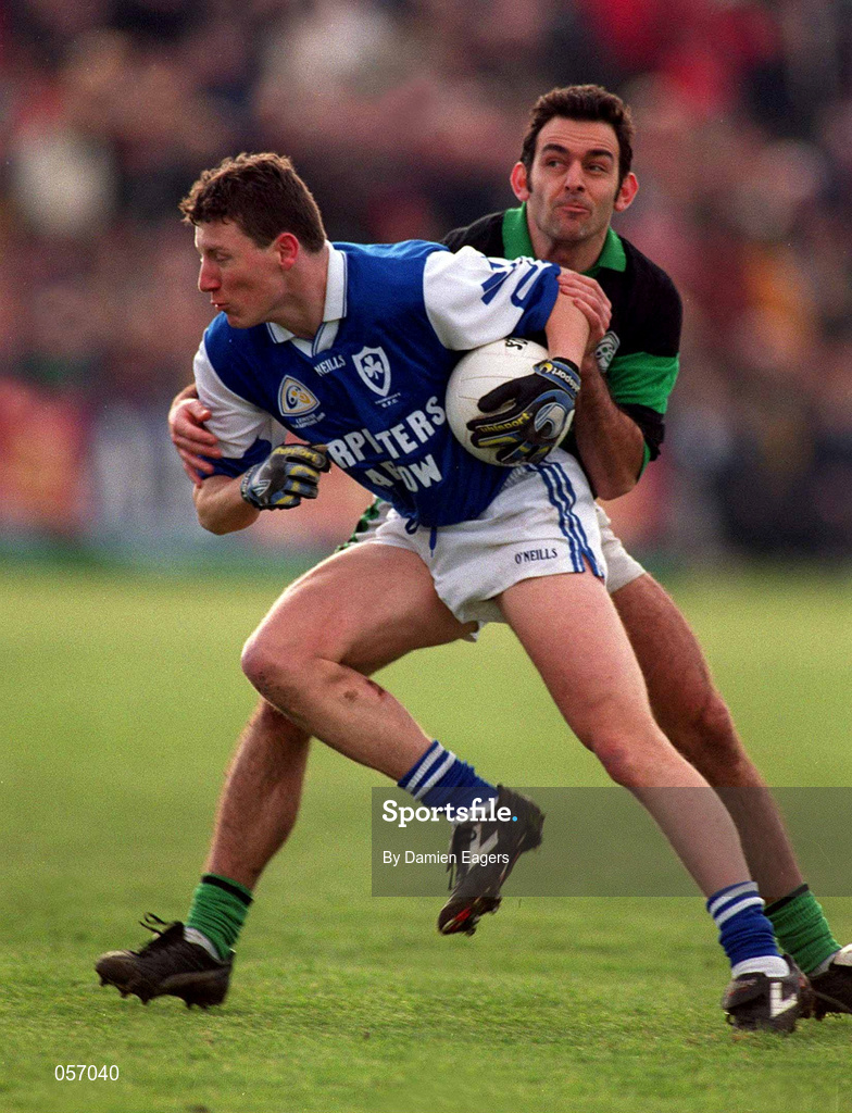 18 February 2001; Breffni Hannon of O'Hanrahan's in action against Liam O'Sullivan of Nemo Rangers during the AIB All-Ireland Senior Club Football Championship Semi-Final match between Nemo Rangers and O'Hanrahan's at the Clonmel Sportsfield in Clonmel, Tipperayr. Photo by Damien Eagers/Sportsfile