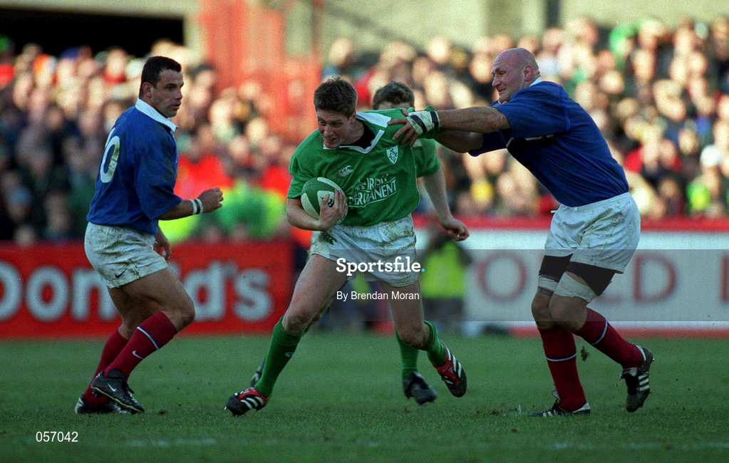 17 February 2001; Ireland's Ronan O'Gara is tackled by Christophe Moni of France during the Lloyds TSB Six Nations Rugby Championship match between Ireland and France at Lansdowne Road in Dublin. Photo by Brendan Moran/Sportsfile