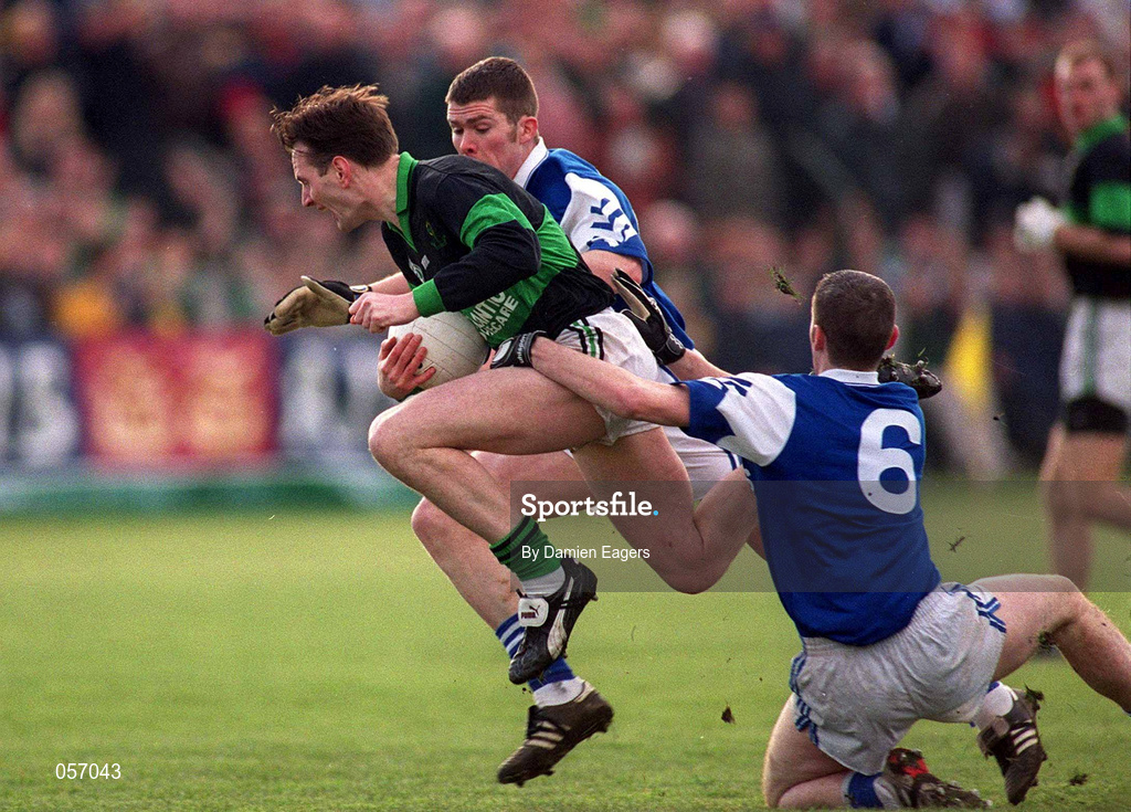 18 February 2001; Kevin Cahill of Nemo Rangers in action against Philip Nolan and Ken Walker, 6, of O'Hanrahan's during the AIB All-Ireland Senior Club Football Championship Semi-Final match between Nemo Rangers and O'Hanrahan's at the Clonmel Sportsfield in Clonmel, Tipperayr. Photo by Damien Eagers/Sportsfile