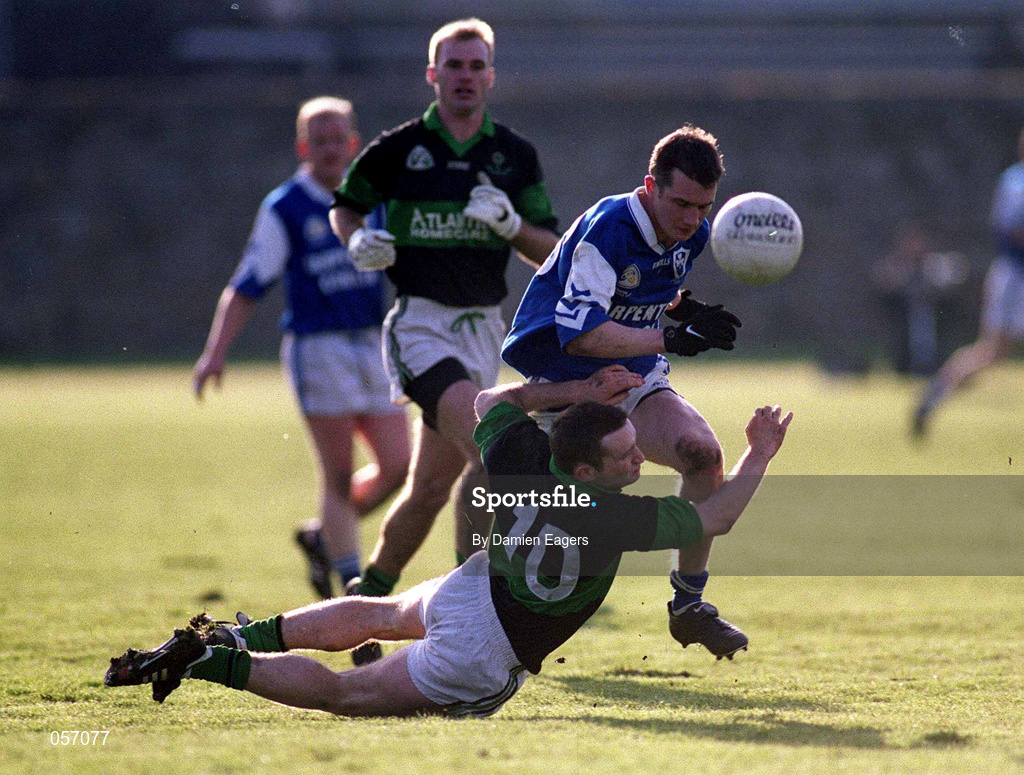 18 February 2001; Mark Carpenter of O'Hanrahan's is tackled by Sean O'Brien of Nemo Rangers during the AIB All-Ireland Senior Club Football Championship Semi-Final match between Nemo Rangers and O'Hanrahan's at the Clonmel Sportsfield in Clonmel, Tipperayr. Photo by Damien Eagers/Sportsfile