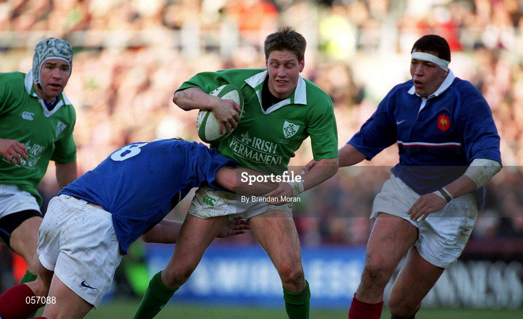 17 February 2001; Ireland's Ronan O'Gara is tackled by Olivier Magne of France during the Lloyds TSB Six Nations Rugby Championship match between Ireland and France at Lansdowne Road in Dublin. Photo by Brendan Moran/Sportsfile