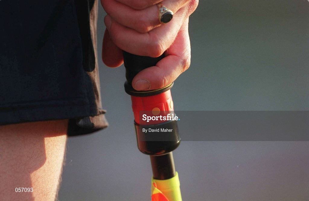 18 February 2001; A detailed view of an assistant referee holding his flag which contains a device to alert the referee during the Eircom League Premier Division match between UCD and Bohemians at Belfield Park in Dublin. Photo by David Maher/Sportsfile