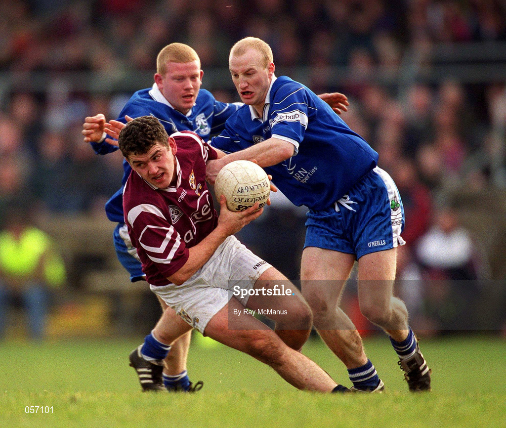 18 February 2001; Enda Lavelle of Crossmolina gets through the tackle of Bellaghy's Gareth Doherty and Peter Diamond during the AIB All-Ireland Senior Club Football Championship Semi-Final match between Crossmolina Deel Rovers and Bellaghy Wolfe Tones at Brewster Park in Enniskillen, Fermanagh. Photo by Ray McManus/Sportsfile