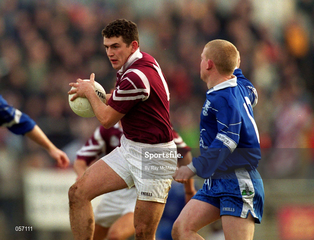 18 February 2001; Enda Lavelle of Crossmolina in action against Gareth Doherty of Bellaghy during the AIB All-Ireland Senior Club Football Championship Semi-Final match between Crossmolina Deel Rovers and Bellaghy Wolfe Tones at Brewster Park in Enniskillen, Fermanagh. Photo by Ray McManus/Sportsfile
