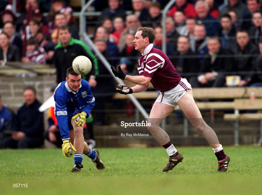 18 February 2001; Tom Nallen of Crossmolina is tackled by Cathal Scullion of Bellaghy during the AIB All-Ireland Senior Club Football Championship Semi-Final match between Crossmolina Deel Rovers and Bellaghy Wolfe Tones at Brewster Park in Enniskillen, Fermanagh. Photo by Ray McManus/Sportsfile