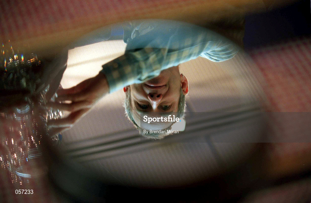 21 February 2001; John McEnroe is reflected on the base of the trophy during a press conference ahead of the KPMG Tennis Challenge / ATP Tour of Champions event to be held at The Point Depot in Dublin. Photo by Brendan Moran/Sportsfile