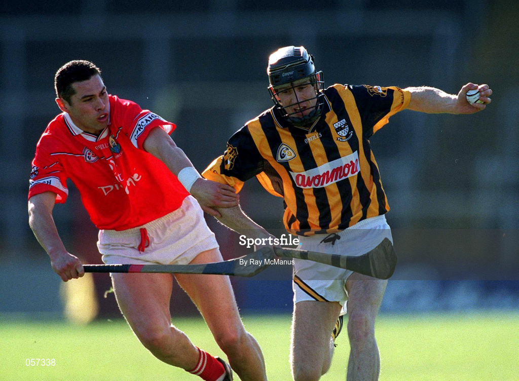 24 February 2001; Stephen Grehan of Kilkenny gets away from Cork's Seán Óg Ó hAilpín during the Allianz National Hurling League Division 1B match between Cork and Kilkenny at Páirc Uí Chaoimh in Cork. Photo by Ray McManus/Sportsfile