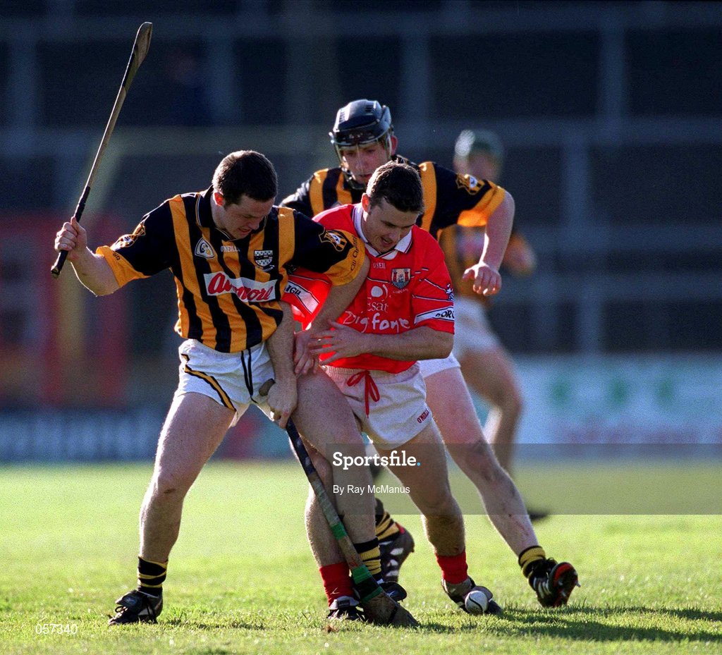 24 February 2001; Michael Kavanagh of Kilkenny in action against Kevin Murray of Cork during the Allianz National Hurling League Division 1B match between Cork and Kilkenny at Páirc Uí Chaoimh in Cork. Photo by Ray McManus/Sportsfile