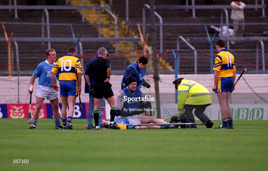 25 February 2001; Tomas McCluskey of Graigue Ballycallan receives treatment for a leg injury during the AIB All-Ireland Senior Club Hurling Championship Semi-Final between Graigue Ballycallan and Sixmilebridge at Semple Stadium in Thurles, Tipperary. Photo by Brendan Moran/Sportsfile