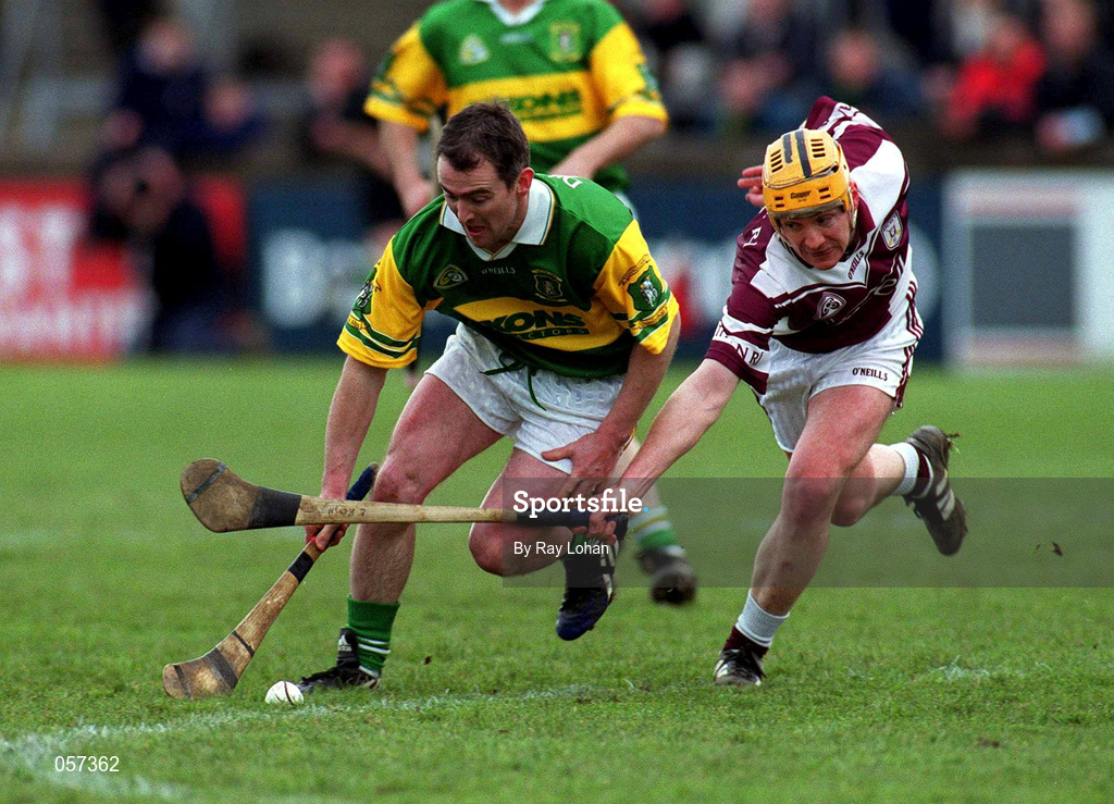 25 February 2001; Dunloy's Alistair Elliott is tackled by Eamonn Keogh of Athnery during the AIB All-Ireland Senior Club Hurling Championship Semi-Final match between Athenry and Dunloy at Parnell Park in Dublin. Photo by Ray Lohan/Sportsfile