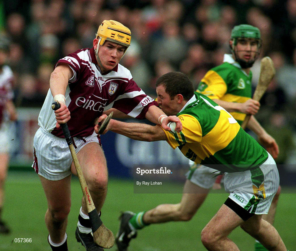 25 February 2001; Athenry's Donal Moran in action against Sean Mullan of Dunloy during the AIB All-Ireland Senior Club Hurling Championship Semi-Final match between Athenry and Dunloy at Parnell Park in Dublin. Photo by Ray Lohan/Sportsfile