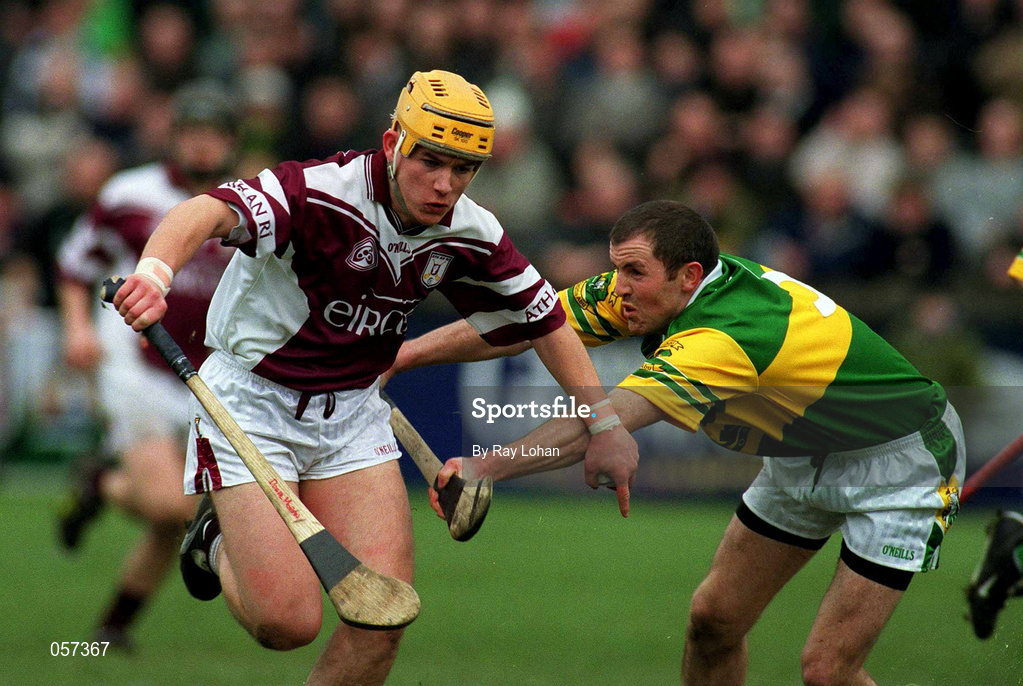 25 February 2001; Athenry's Donal Moran in action against Sean Mullan of Dunloy during the AIB All-Ireland Senior Club Hurling Championship Semi-Final match between Athenry and Dunloy at Parnell Park in Dublin. Photo by Ray Lohan/Sportsfile