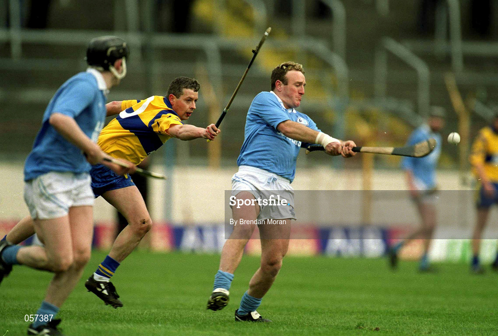 25 February 2001; Johnny Butler of Graigue Ballycallan in action against Brian Kennedy of Sixmilebridge during the AIB All-Ireland Senior Club Hurling Championship Semi-Final between Graigue Ballycallan and Sixmilebridge at Semple Stadium in Thurles, Tipperary. Photo by Brendan Moran/Sportsfile