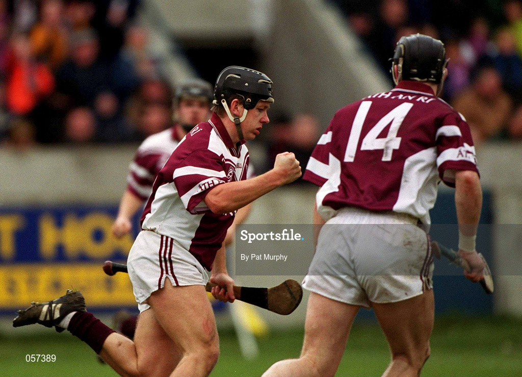 25 February 2001; Athenry's Cathal Moran, left, celebrates after scoring his side's second goal with team-mate Eugene Cloonan, 14, during the AIB All-Ireland Senior Club Hurling Championship Semi-Final match between Athenry and Dunloy at Parnell Park in Dublin. Photo by Pat Murphy/Sportsfile