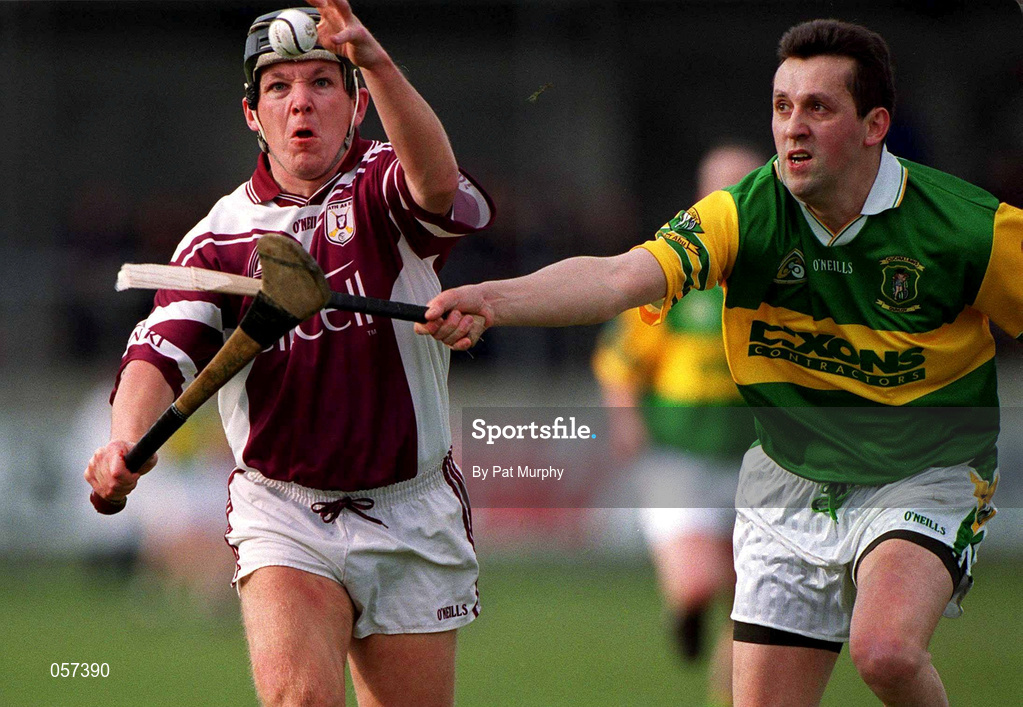 25 February 2001; Athenry's Cathal Moran in action against Sean McIlhatton of Dunloy during the AIB All-Ireland Senior Club Hurling Championship Semi-Final match between Athenry and Dunloy at Parnell Park in Dublin. Photo by Pat Murphy/Sportsfile