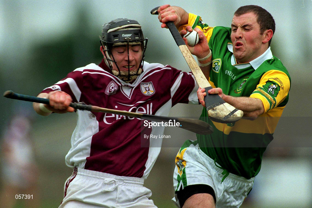 25 February 2001; Athenry's Eugene Cloonan in action against Sean Mullan of Dunloy during the AIB All-Ireland Senior Club Hurling Championship Semi-Final match between Athenry and Dunloy at Parnell Park in Dublin. Photo by Ray Lohan/Sportsfile