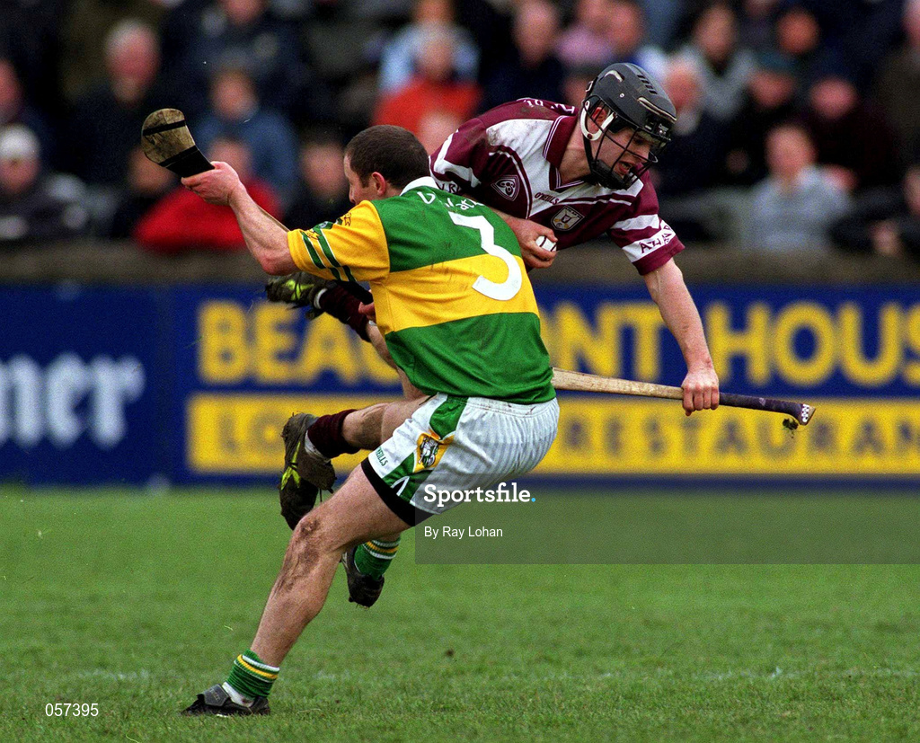 25 February 2001; Athenry's David Donogue in action against Sean Mullan of Dunloy during the AIB All-Ireland Senior Club Hurling Championship Semi-Final match between Athenry and Dunloy at Parnell Park in Dublin. Photo by Ray Lohan/Sportsfile