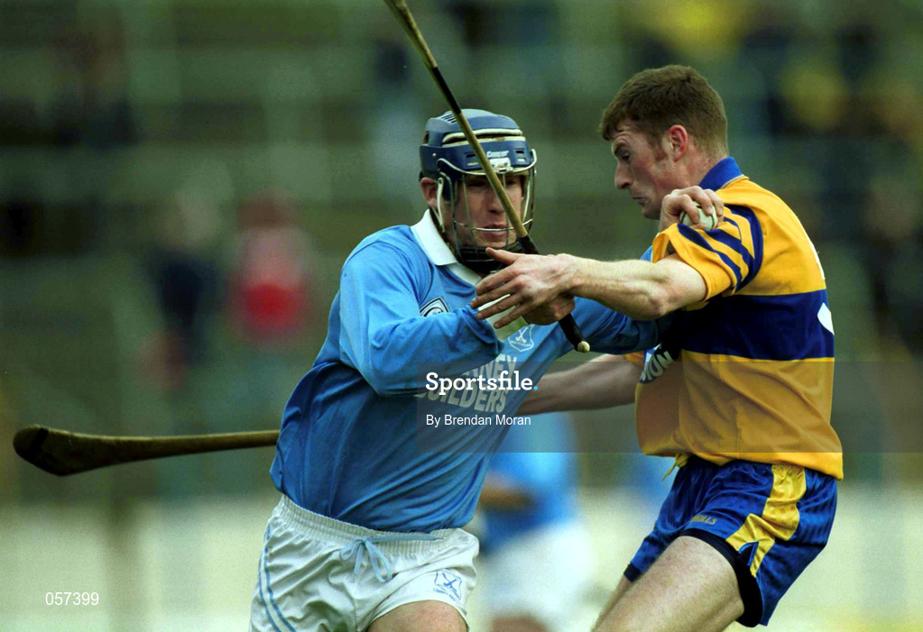 25 February 2001; Denis Byrne of Graigue Ballycallan holds off the challenge of Declan Murphy of Sixmilebridge during the AIB All-Ireland Senior Club Hurling Championship Semi-Final between Graigue Ballycallan and Sixmilebridge at Semple Stadium in Thurles, Tipperary. Photo by Brendan Moran/Sportsfile