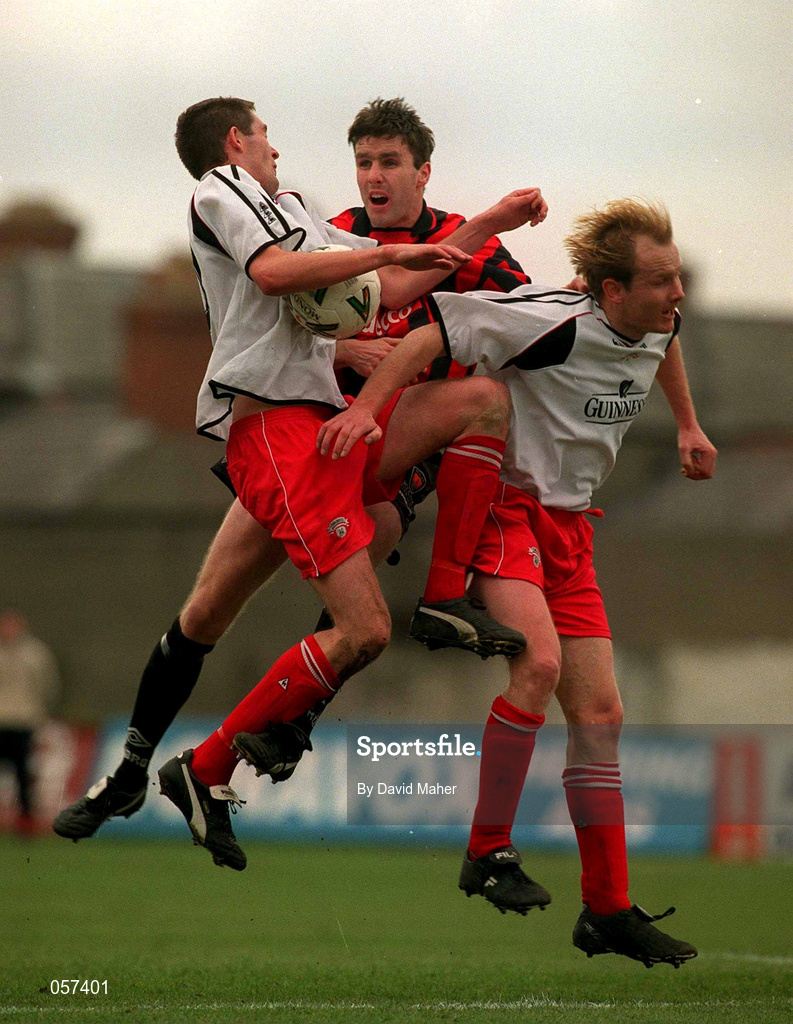 25 February 2001;  Noel Hartigan, left, and Anthony Buckley of Cork City in action against Shaun Maher of Bohemians during the Eircom League Premier Division match between Bohemians and Cork City at Dalymount Park in Dublin. Photo by David Maher/Sportsfile