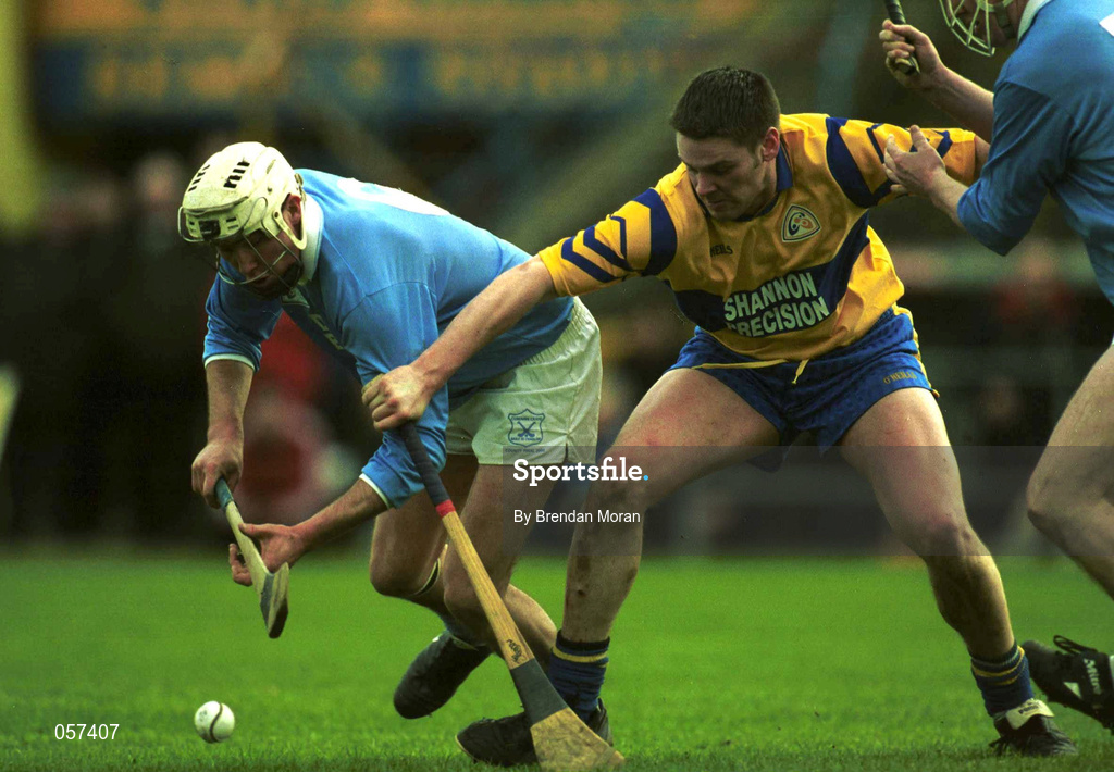 25 February 2001; Tomas Comerford of Graigue Ballycallan in action agant John Reddan of Sixmilebridge during the AIB All-Ireland Senior Club Hurling Championship Semi-Final between Graigue Ballycallan and Sixmilebridge at Semple Stadium in Thurles, Tipperary. Photo by Brendan Moran/Sportsfile