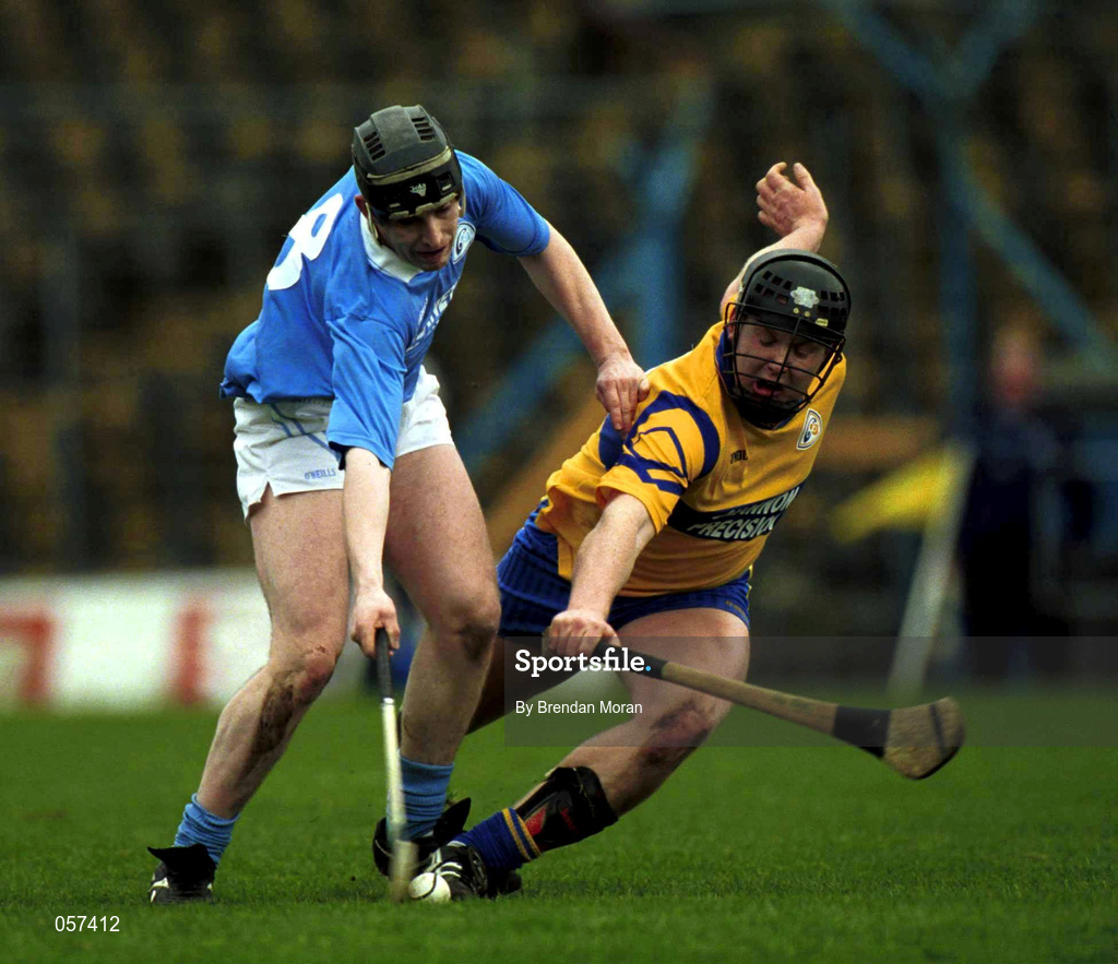 25 February 2001; James Young of Graigue Ballycallan in action agant Pat Hayes of Sixmilebridge during the AIB All-Ireland Senior Club Hurling Championship Semi-Final between Graigue Ballycallan and Sixmilebridge at Semple Stadium in Thurles, Tipperary. Photo by Brendan Moran/Sportsfile
