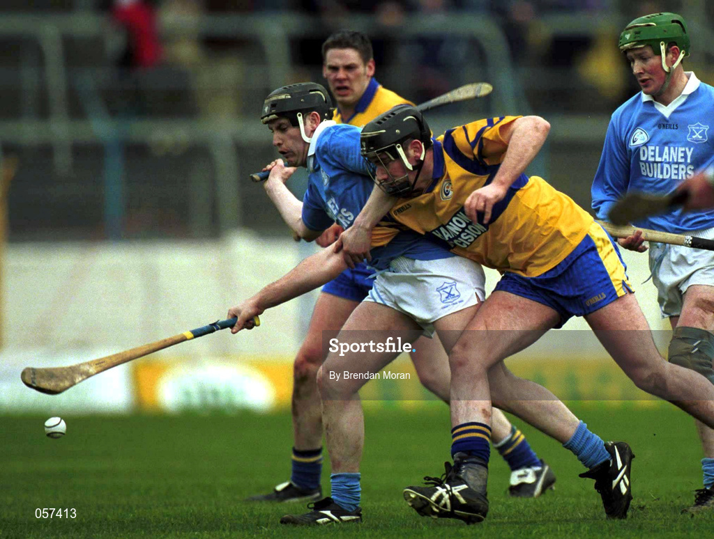 25 February 2001; Stiofan Fitzpatrick of Sixmilebridge in action against James Young of Graigue Ballycallan during the AIB All-Ireland Senior Club Hurling Championship Semi-Final between Graigue Ballycallan and Sixmilebridge at Semple Stadium in Thurles, Tipperary. Photo by Brendan Moran/Sportsfile