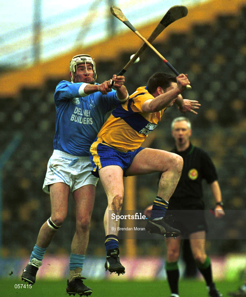 25 February 2001; Tomas Comerford of Graigue Ballycallan in action agant John Reddan of Sixmilebridge during the AIB All-Ireland Senior Club Hurling Championship Semi-Final between Graigue Ballycallan and Sixmilebridge at Semple Stadium in Thurles, Tipperary. Photo by Brendan Moran/Sportsfile