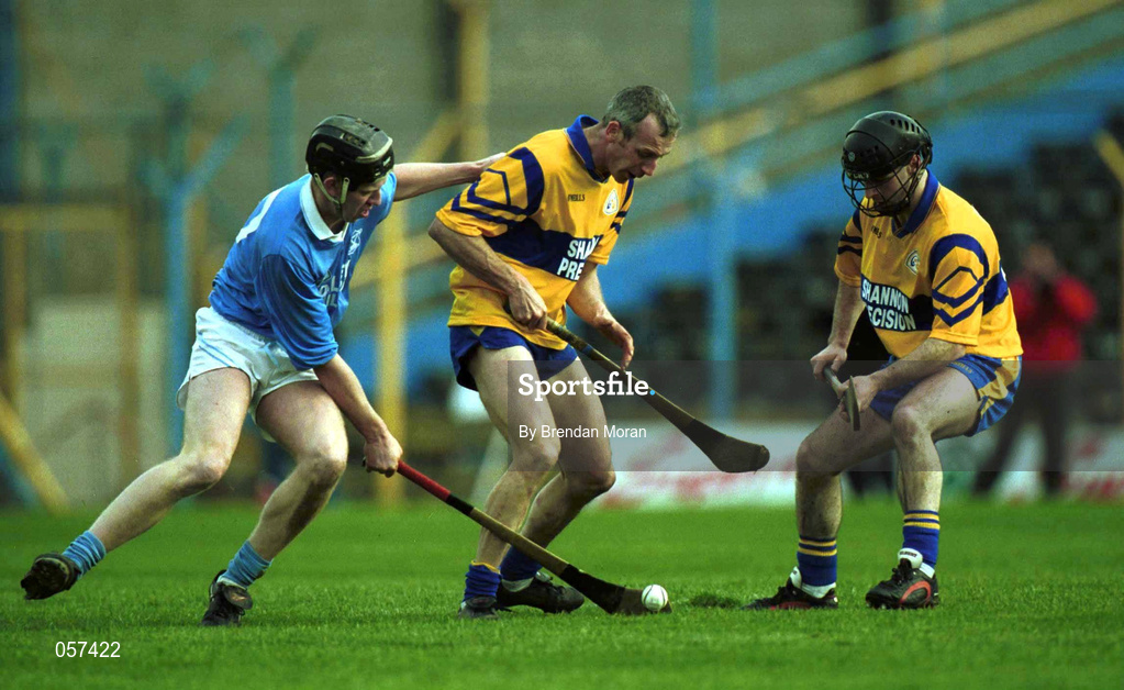25 February 2001; Kevin McInerney with the support of his Sixmilebridge team-mate Martin Conlon, right, in action against Michael Hoyne of Graigue Ballycallan during the AIB All-Ireland Senior Club Hurling Championship Semi-Final between Graigue Ballycallan and Sixmilebridge at Semple Stadium in Thurles, Tipperary. Photo by Brendan Moran/Sportsfile