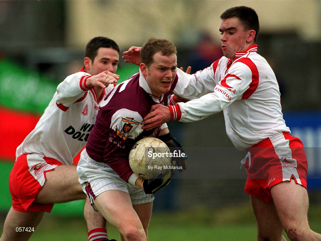 25 February 2001; John Donnellan of Galway under pressure from Ciaran Gourley, left, and Ryan McMenamin of Tyrone during the Allianz National Football League Division 1A match between Galway and Tyrone at Duggan Park in Ballinasloe, Galway. Photo by Ray McManus/Sportsfile